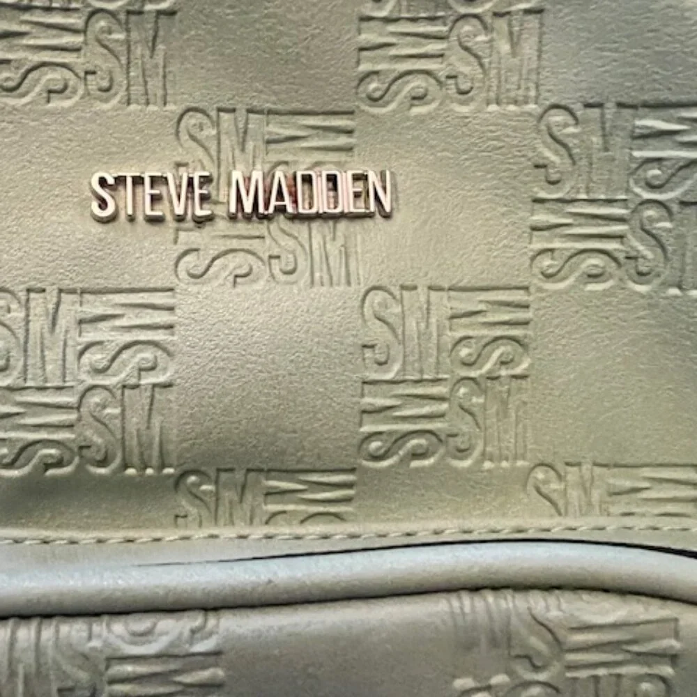 Steve Madden mini backpack zip closure, exterior front zip pocket, adjust straps